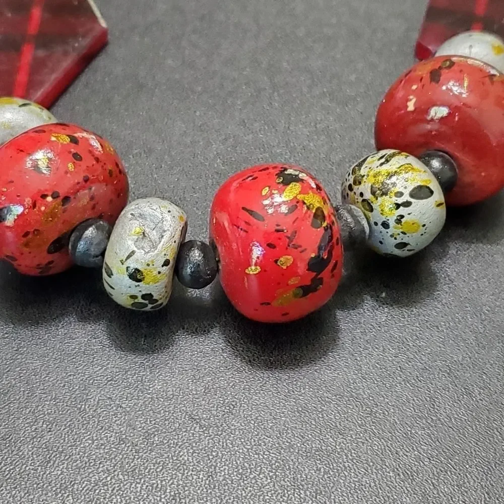 Red and black painted wood bead necklace 28